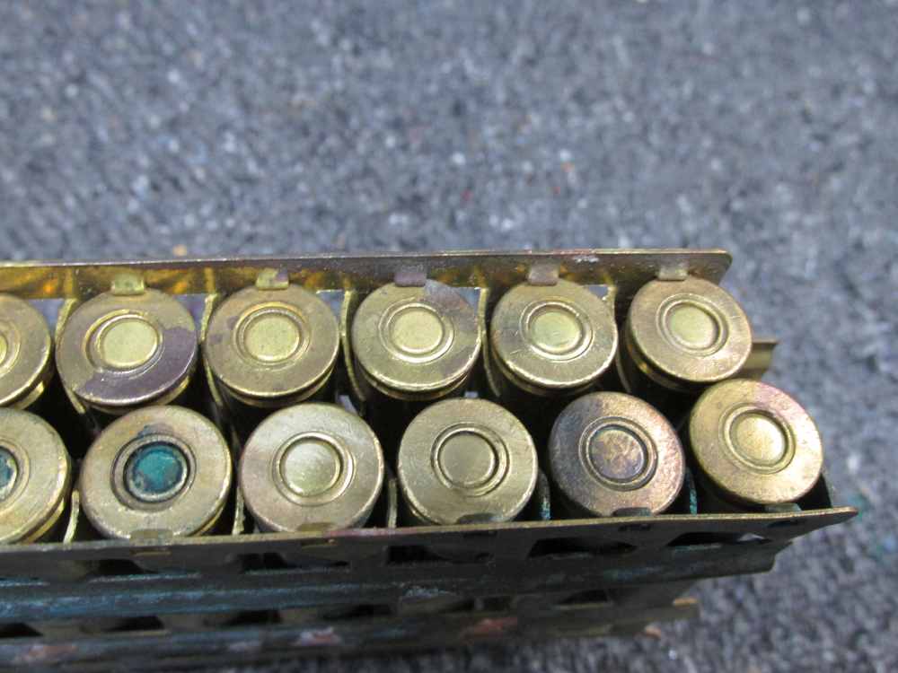 60 ROUNDS WWII JAPANESE 7.7x58mm SEMI RIMMED AMMO ON 2 BRASS MG FEED STRIPS-img-6