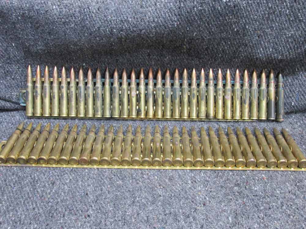 60 ROUNDS WWII JAPANESE 7.7x58mm SEMI RIMMED AMMO ON 2 BRASS MG FEED STRIPS-img-0