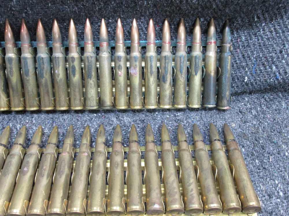 60 ROUNDS WWII JAPANESE 7.7x58mm SEMI RIMMED AMMO ON 2 BRASS MG FEED STRIPS-img-1