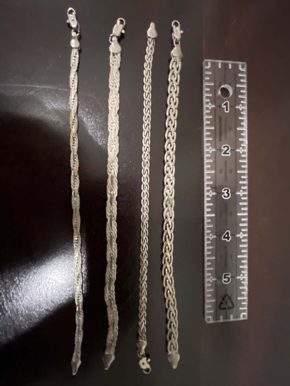 Four .925 Sterling silver Bracelets-img-0