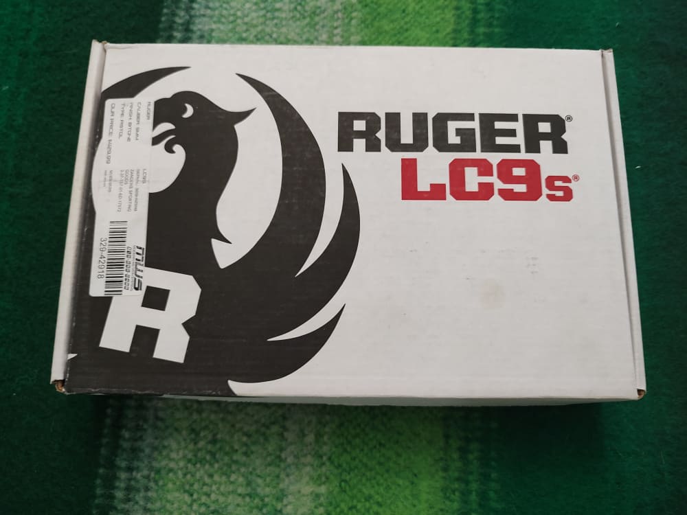 RUGER LC9s WITH NICKEL PLATED SLIDE AND FACTORY SCROLLING-img-15