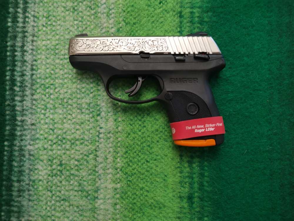 RUGER LC9s WITH NICKEL PLATED SLIDE AND FACTORY SCROLLING-img-0