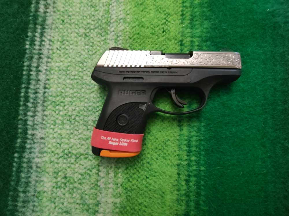 RUGER LC9s WITH NICKEL PLATED SLIDE AND FACTORY SCROLLING-img-4