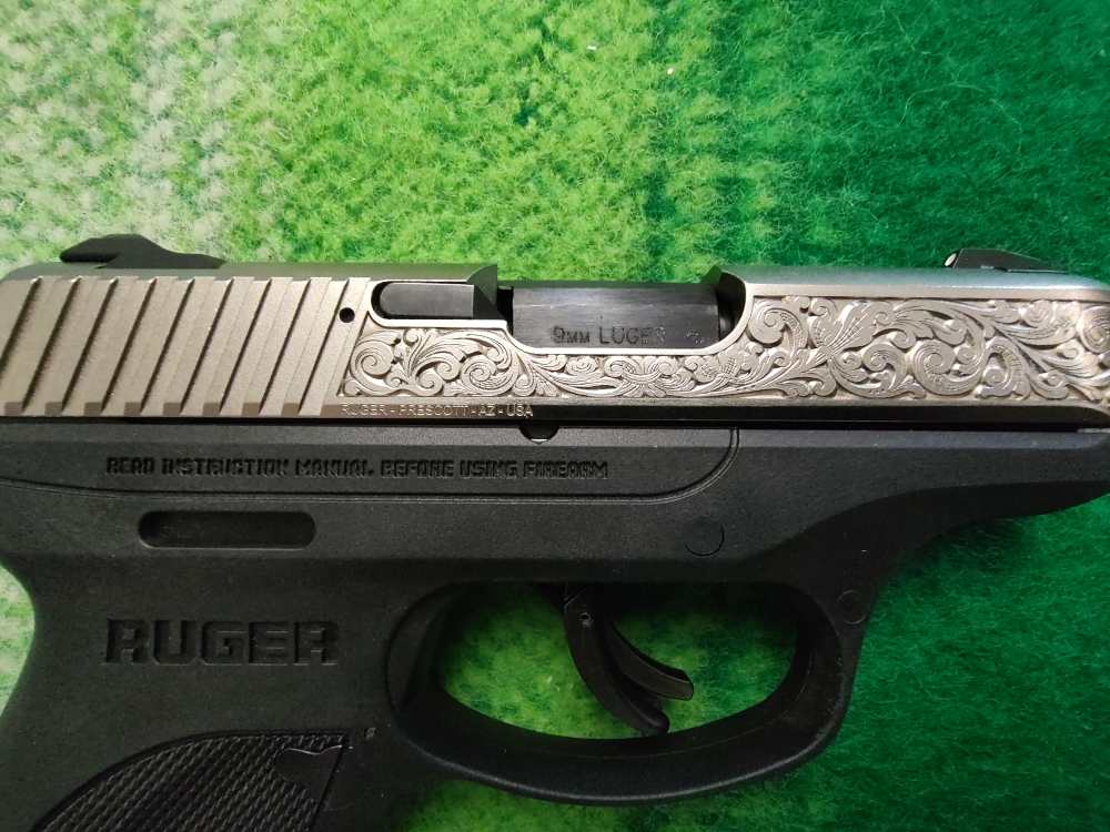RUGER LC9s WITH NICKEL PLATED SLIDE AND FACTORY SCROLLING-img-9