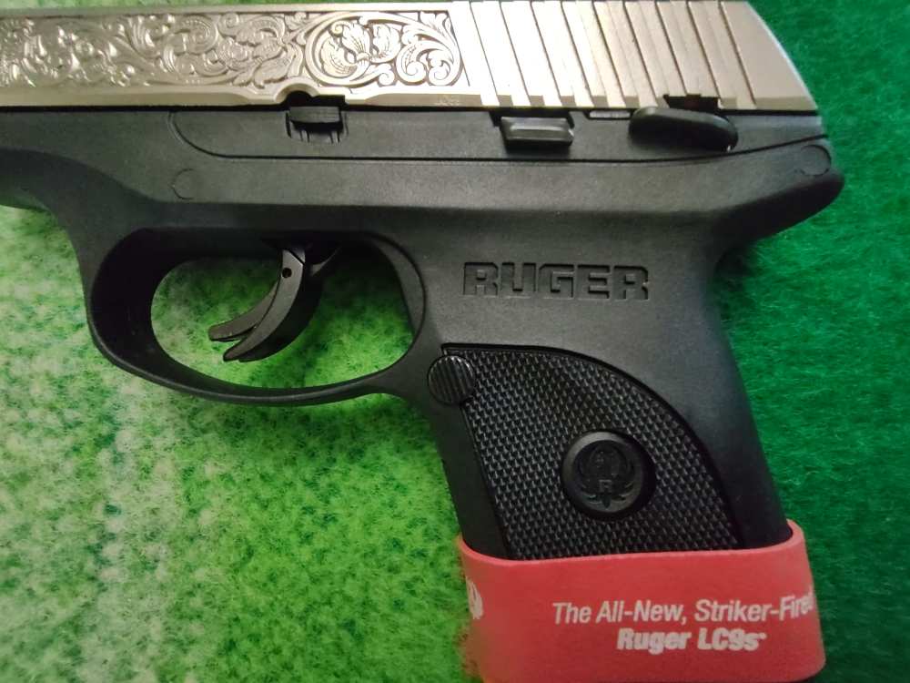 RUGER LC9s WITH NICKEL PLATED SLIDE AND FACTORY SCROLLING-img-2