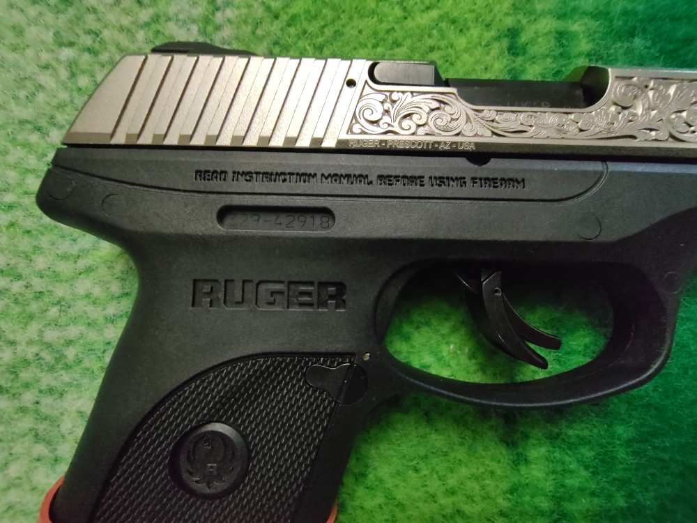 RUGER LC9s WITH NICKEL PLATED SLIDE AND FACTORY SCROLLING-img-7