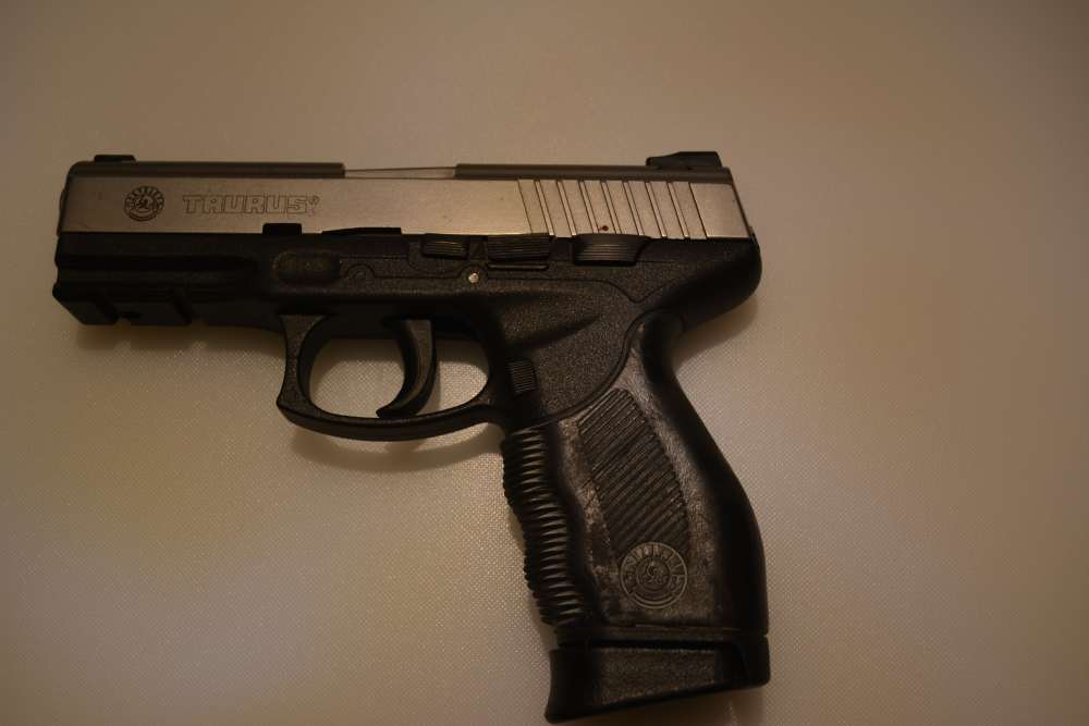 TAURUS FIREARMS MODEL PT24/7 40S&W -img-0