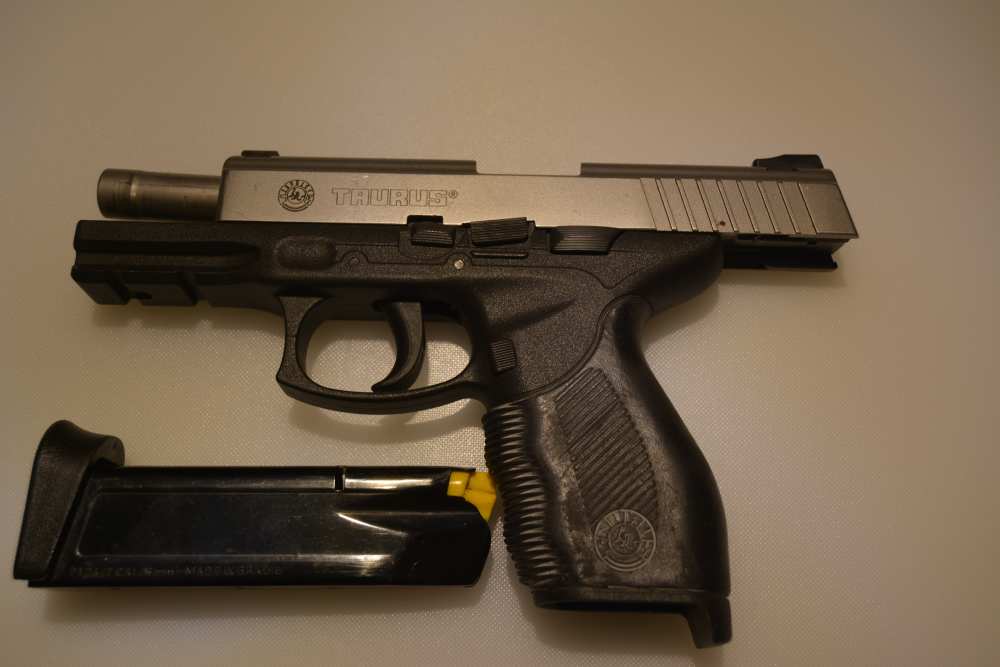 TAURUS FIREARMS MODEL PT24/7 40S&W -img-2