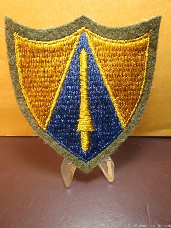 U.S. WW 2, 65th. Calvary Division unit patch on green wool-img-0
