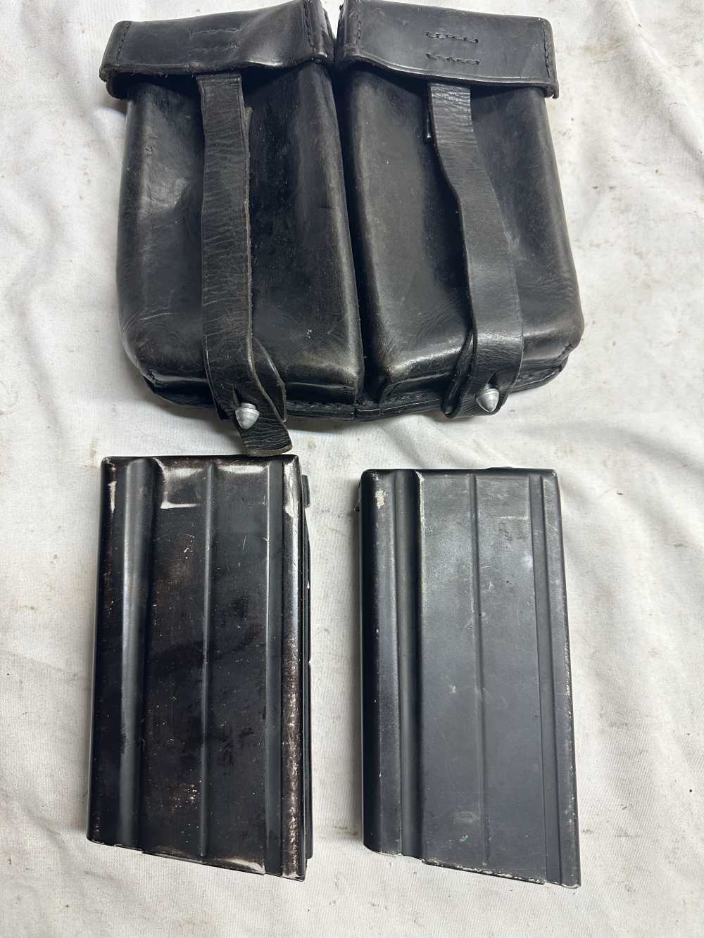 2- ALUMINUM FAL MAGAZINES WITH LEATHER POUCH-img-0