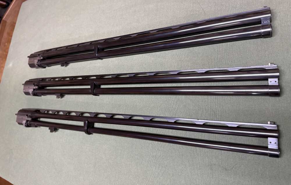 Used Krieghoff K-32: 3 Barrel Set. 28" in 20, 28, 410 w/ Skeet Chokes-img-1
