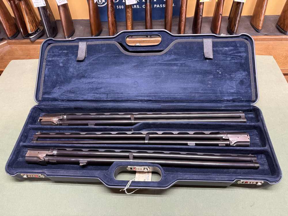 Used Krieghoff K-32: 3 Barrel Set. 28" in 20, 28, 410 w/ Skeet Chokes-img-0