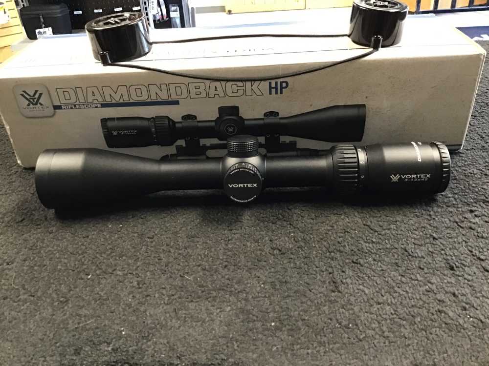 Vortex 3x12x42 Diamondback HP with shade extension and scope rings -img-0