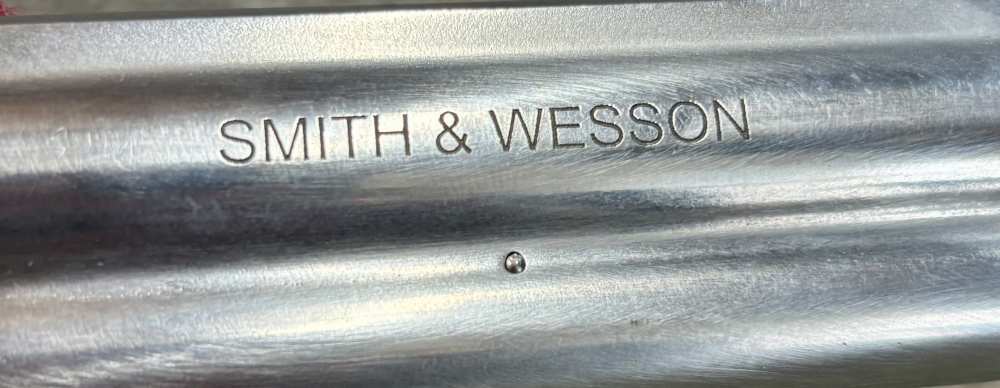 Smith & Wesson 617 -6  Ten Shot 22 LR with 4 inch barrel mint in box -img-19