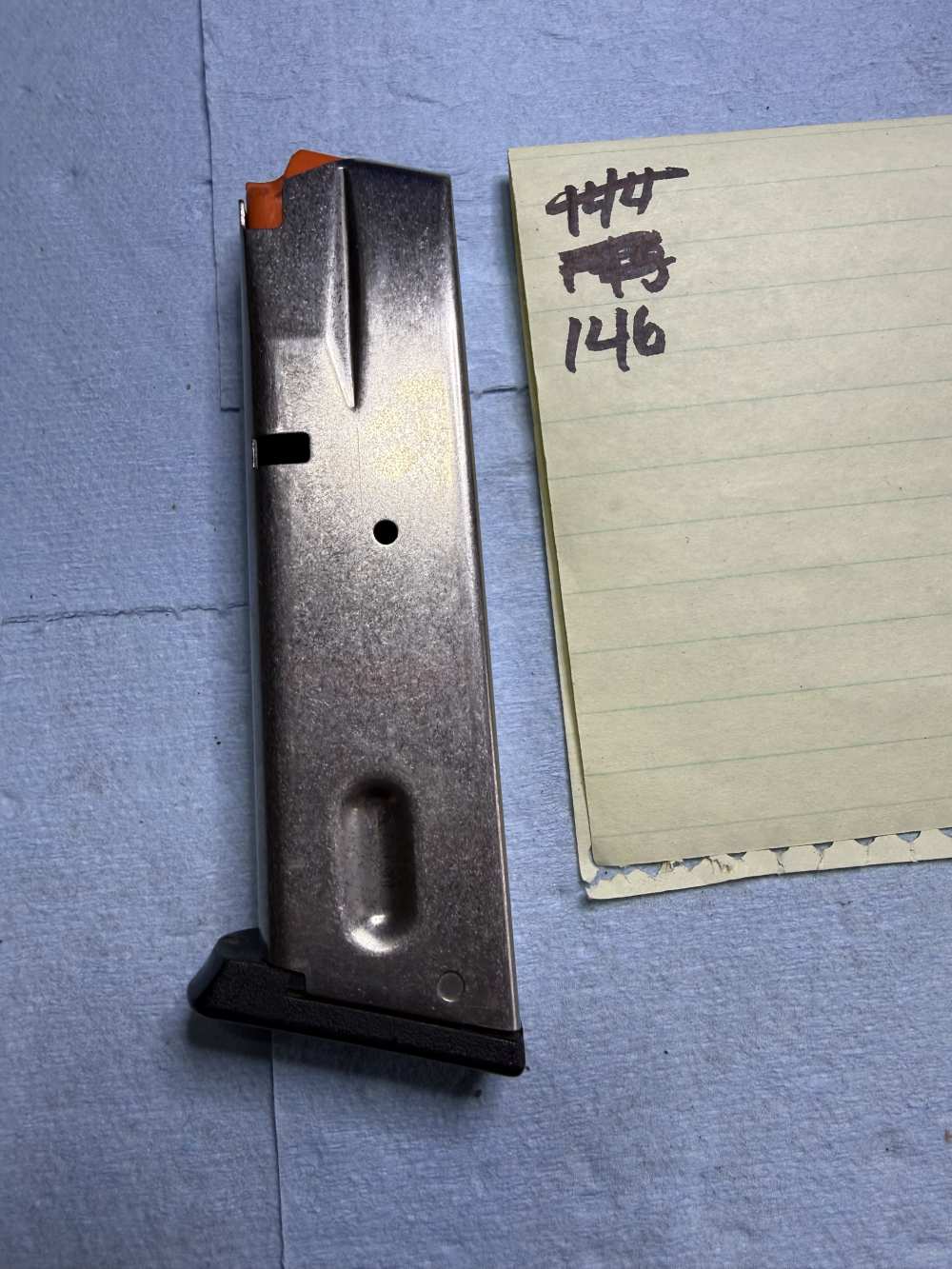 146. S&W M&P9 15rd 9mm Factory Magazine SS Orange Follower Used-img-1