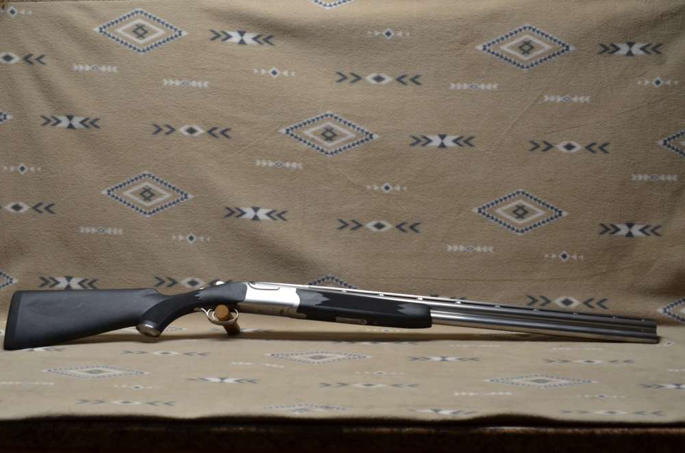 "1999" Ruger Red Label  Stainless Steel & Synthetic  12 Gauge-img-1