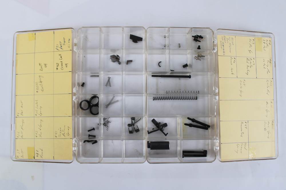 DAN WESSON REVOLVER PARTS LOT 40 PIECES BARREL NUTS, FIRING PINS, SPRINGS-img-0