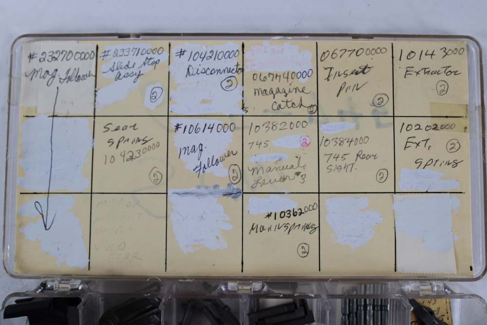 SMITH & WESSON MODEL 645 & 745 FACTORY PARTS LOT – 55 PIECES -img-1