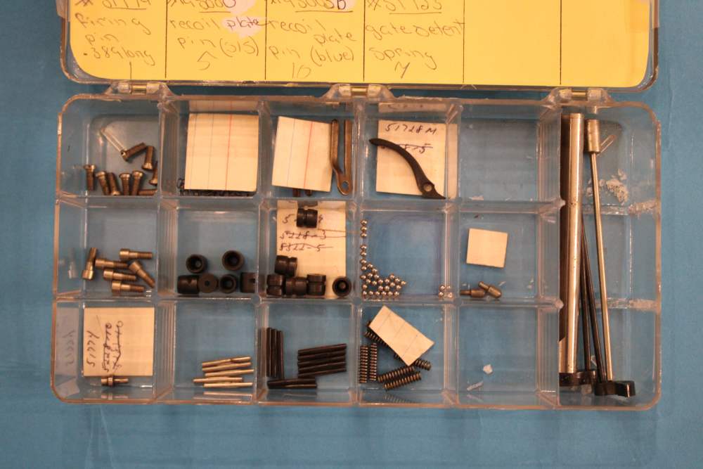 COLT MODEL Q FRAME FRONTIER SCOUT .22 REVOLVER PARTS LOT – 121 PIECES-img-0