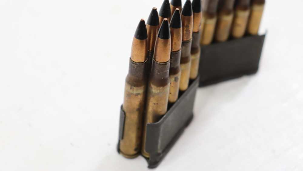TWO ORG M1 GARAND ENBLOCS W/ .30 CAL AP ROUNDS-img-1