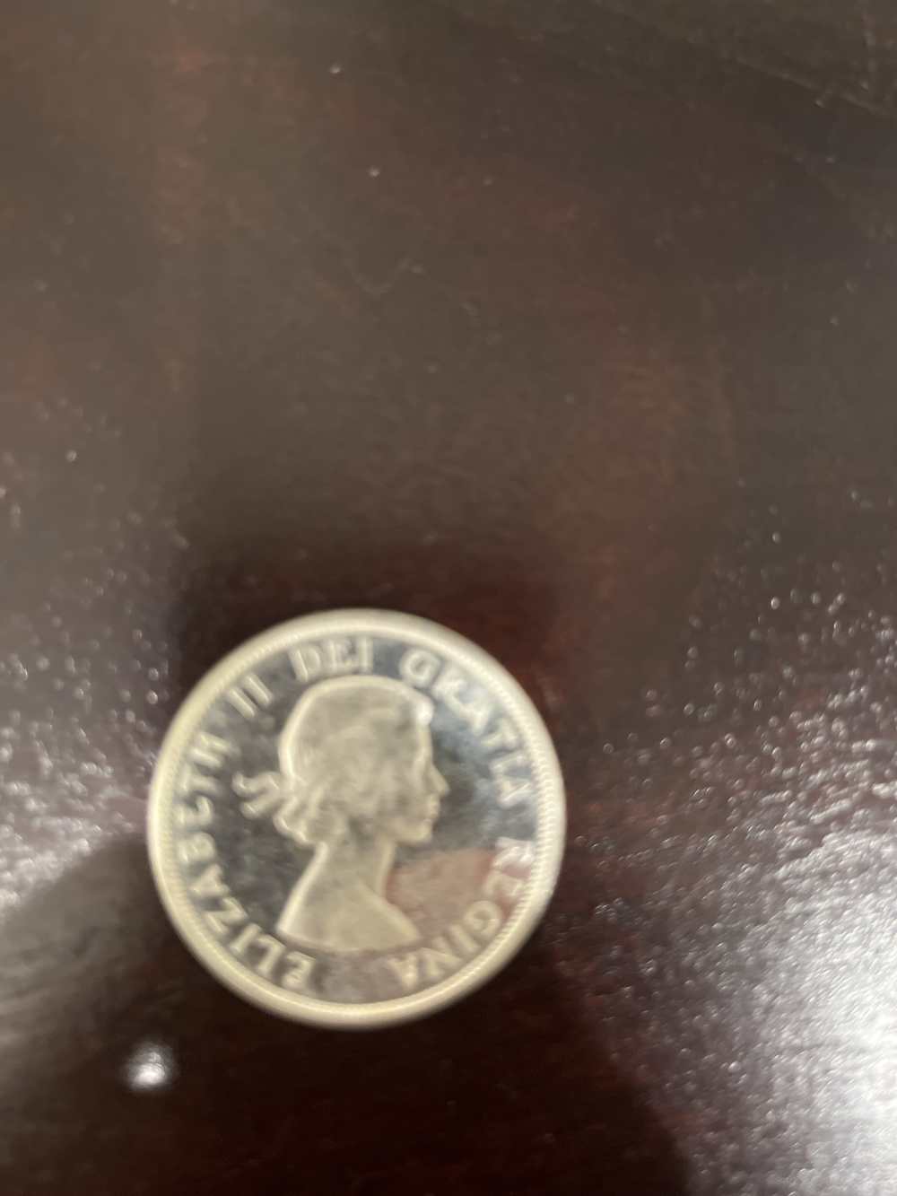 1864-1964 Canadian silver dollar -img-1