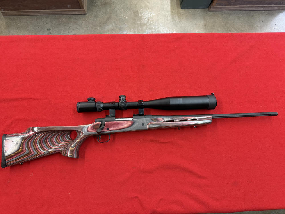 MOSSBERG 100 ATR .243 RIFLE WITH A BARSKA10x40x50  SCOPE-img-1
