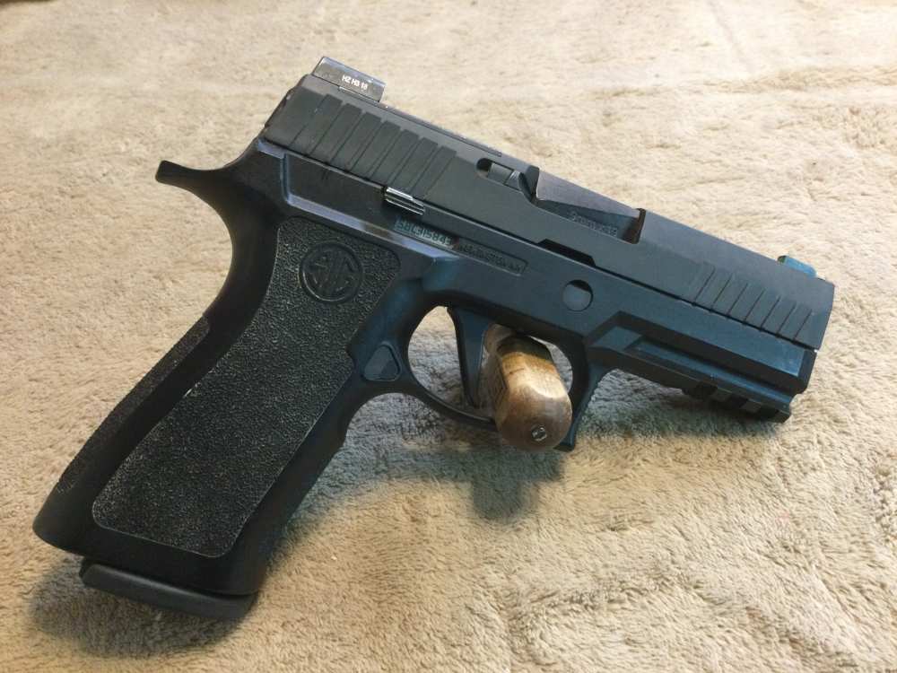 SIG SAUER P320 X-CARRY SEMI-AUTO PISTOL in 9mm Cal.-img-1