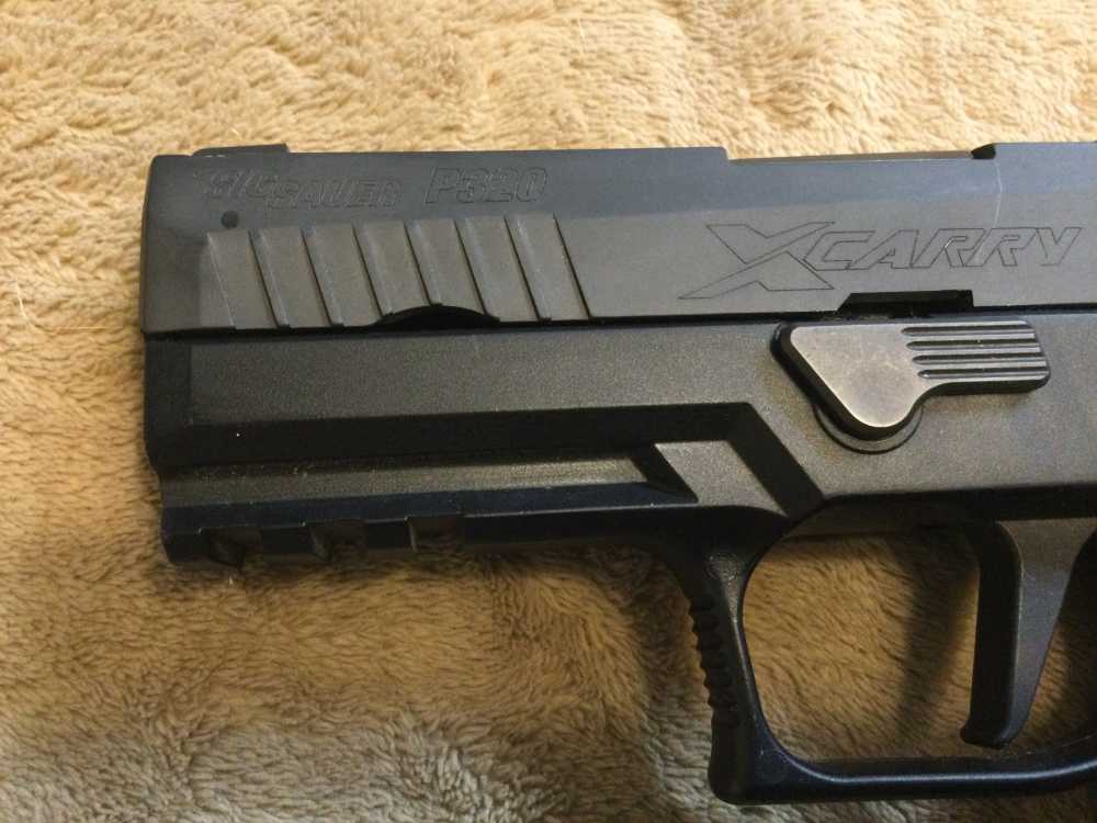 SIG SAUER P320 X-CARRY SEMI-AUTO PISTOL in 9mm Cal.-img-6