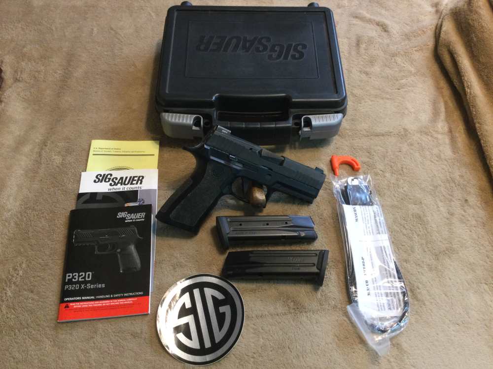 SIG SAUER P320 X-CARRY SEMI-AUTO PISTOL in 9mm Cal.-img-0