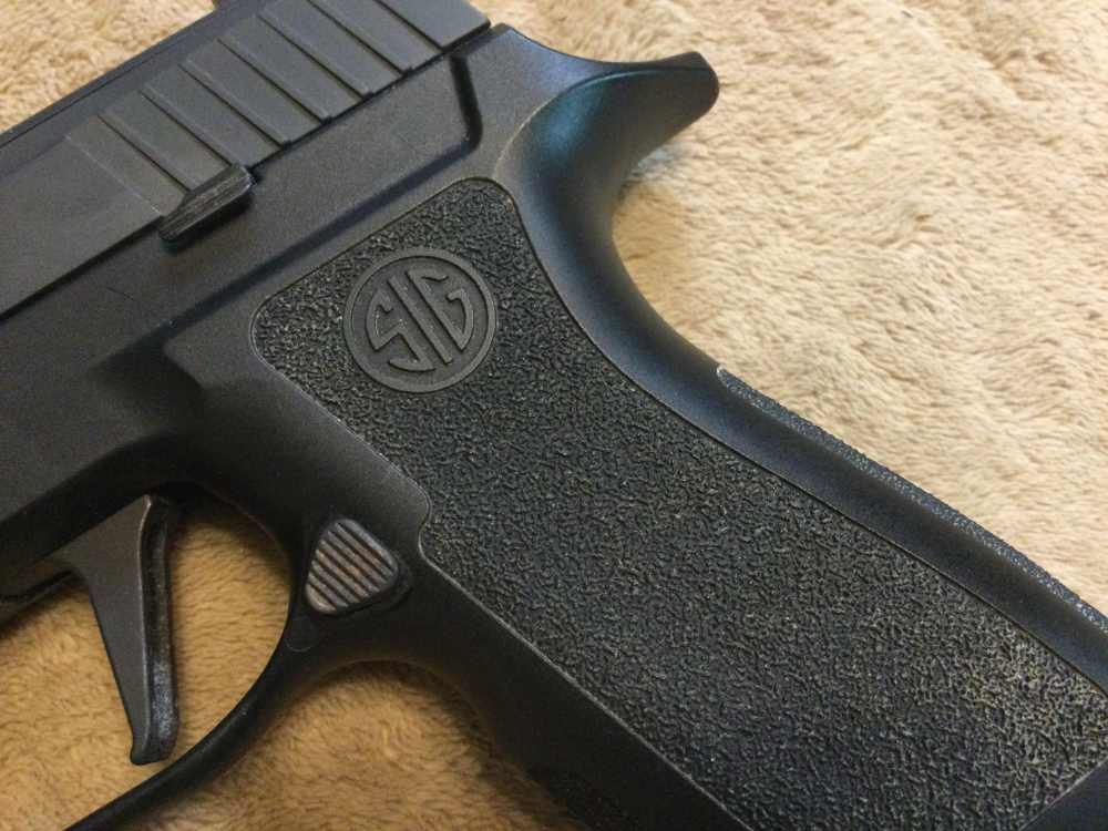 SIG SAUER P320 X-CARRY SEMI-AUTO PISTOL in 9mm Cal.-img-4