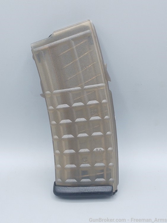 Steyr AUG 30 Round Magazine- NEW OLD STOCK-Amber w/black floorplate-img-1