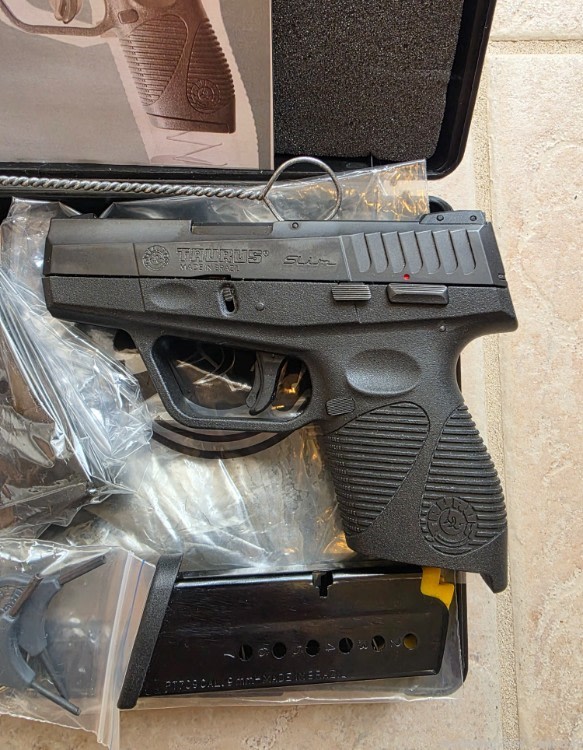 TAURUS PT 709 SLIM 9MM-img-1