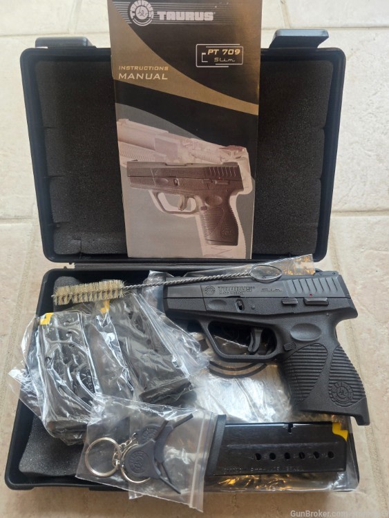 TAURUS PT 709 SLIM 9MM-img-0