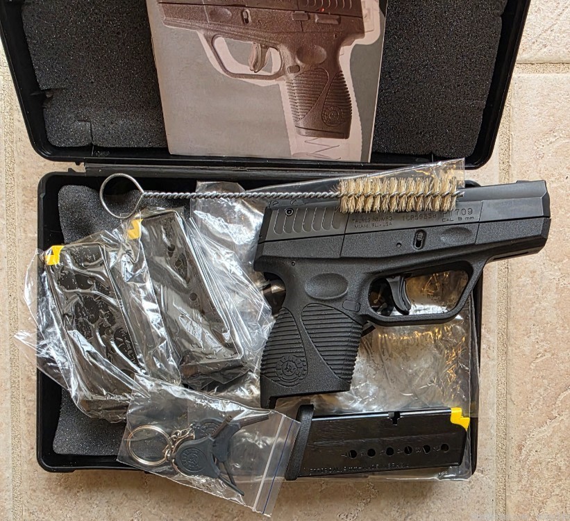 TAURUS PT 709 SLIM 9MM-img-2