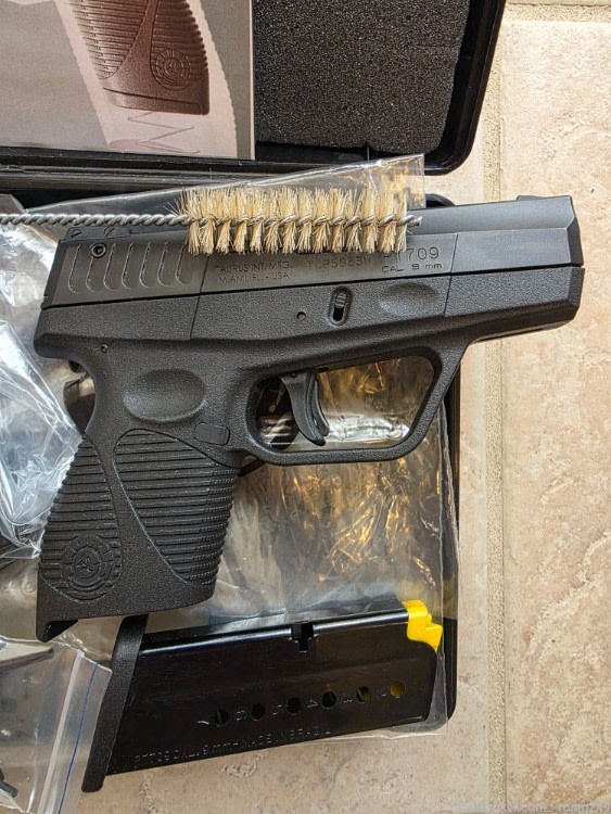 TAURUS PT 709 SLIM 9MM-img-3