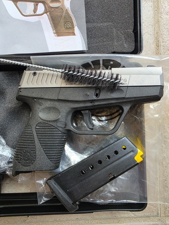 NEW TAURUS PT 709 SLIM 9MM STAINLESS-img-2