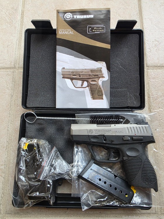 NEW TAURUS PT 709 SLIM 9MM STAINLESS-img-0