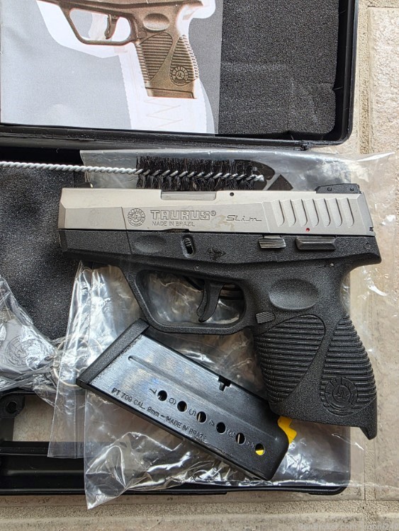 NEW TAURUS PT 709 SLIM 9MM STAINLESS-img-1