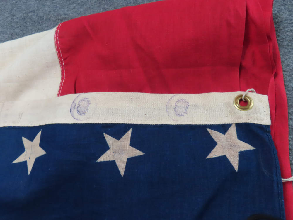 WWII 48 STAR FLAG BANNER THAT MEASURES 2' BY 10' WITH UNKNOWN MARKING-img-9