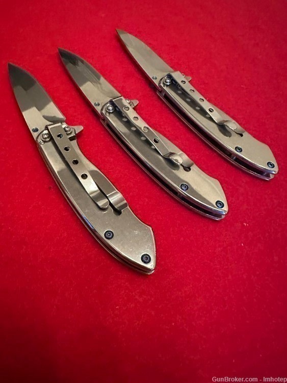 Three Stainless Spring Assist Knives-img-0
