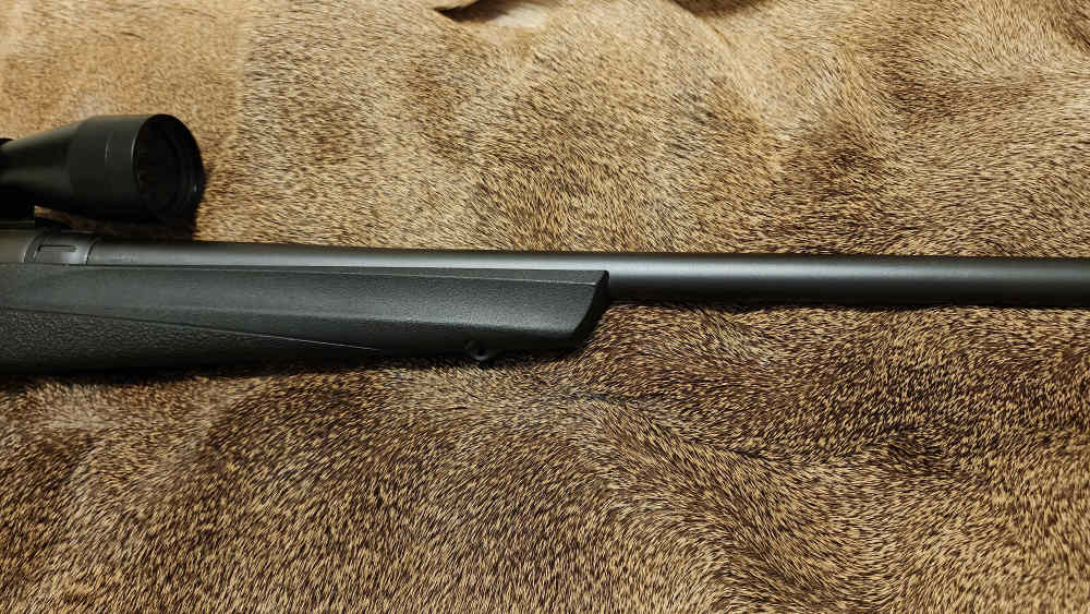 Remington Model 783 synthetic 300 Win Mag WINMAG 24" barrel 3-9x40 scope-img-1