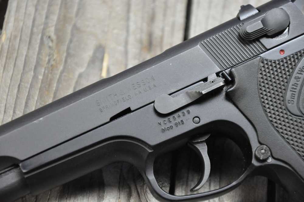 Clean Smith & Wesson Model 915 9mm w/ 2 Mags-img-7