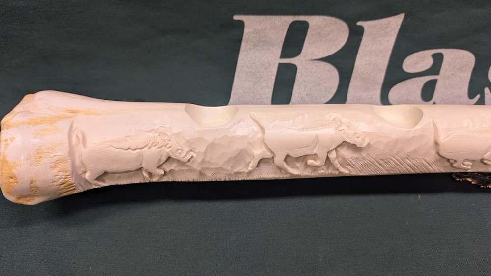GIRAFFE LEG BONE CARVED WITH WARTHOGS. AND TEA CANDLES-img-2