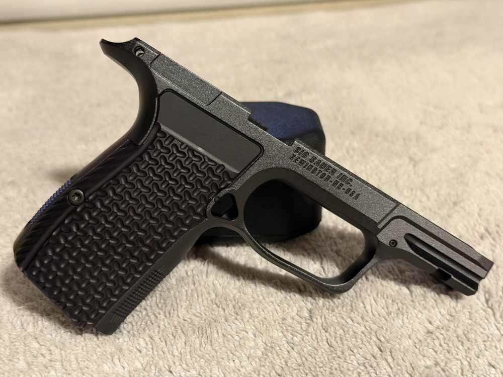 Mint condition P365 LUXE Grip Module. Factory Black LUXE Cerakote-img-1