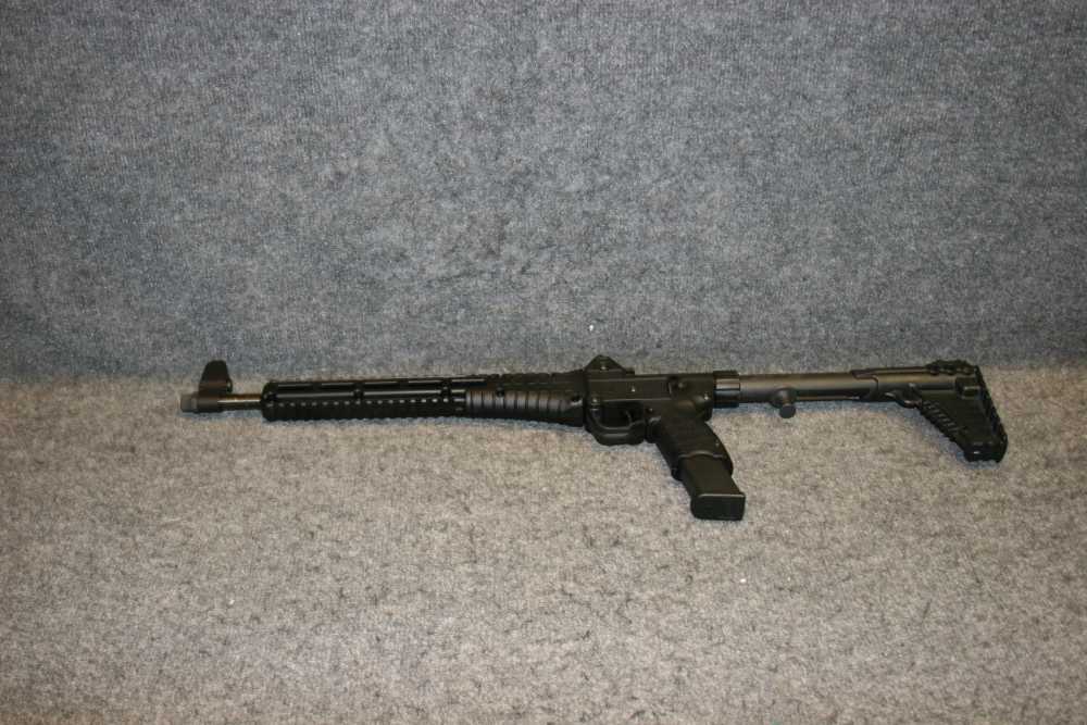 Kel Tec SUB 2000 rifle in .9MM takes Glock mags / foldable firearm-img-3
