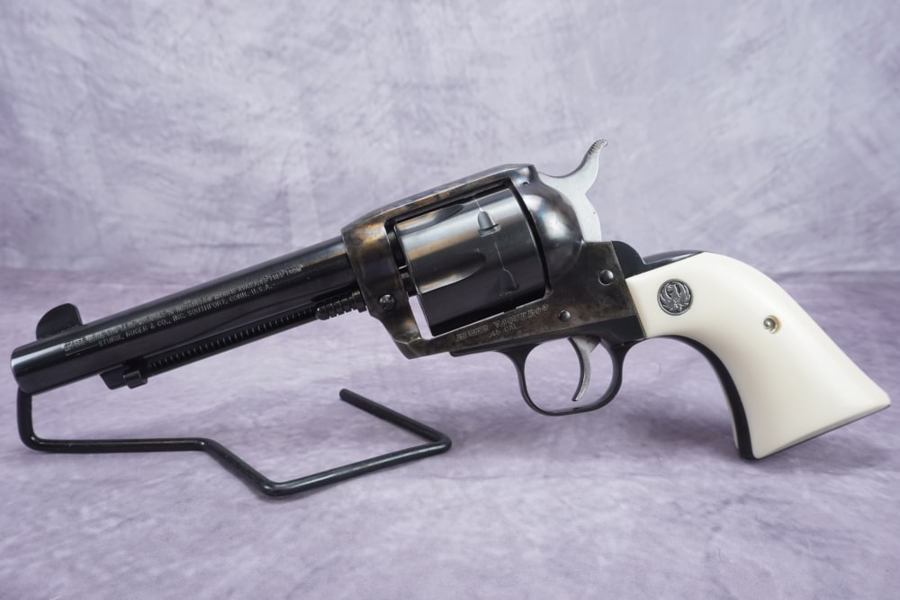 Ruger Vaquero .45 Colt 5.5" Blued/Case Hardened w/ Faux Ivory Grips-img-1