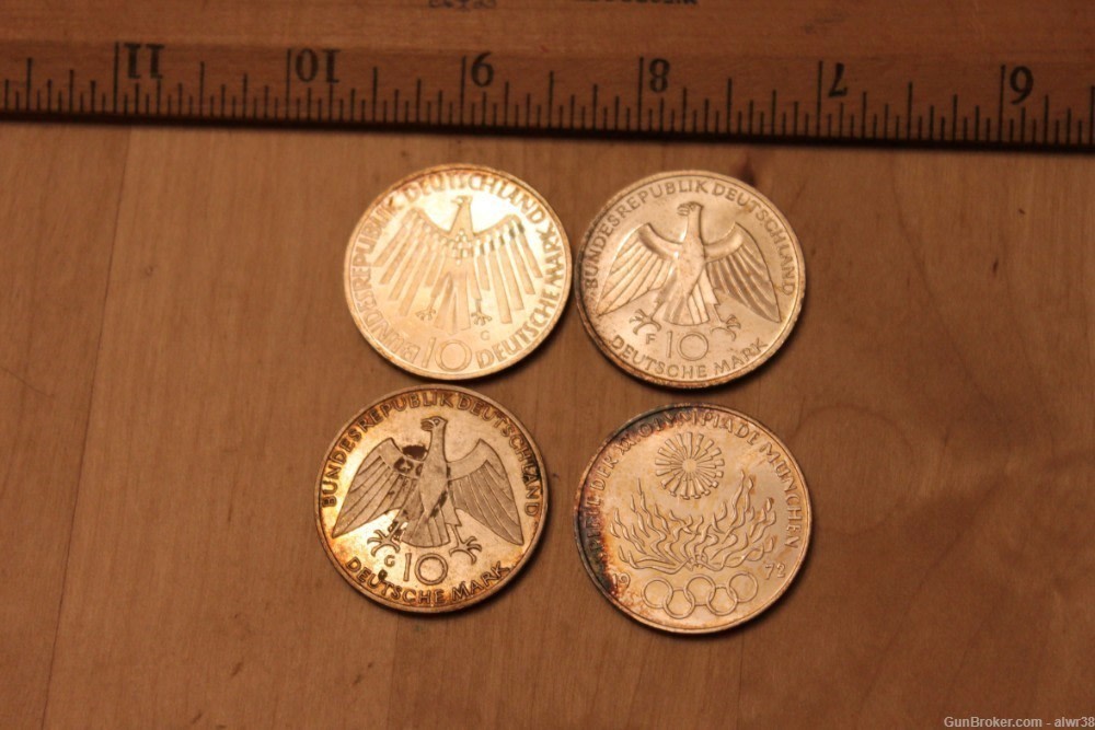 Lot of 4 silver Olympic coins 1.24 oz silver-img-0