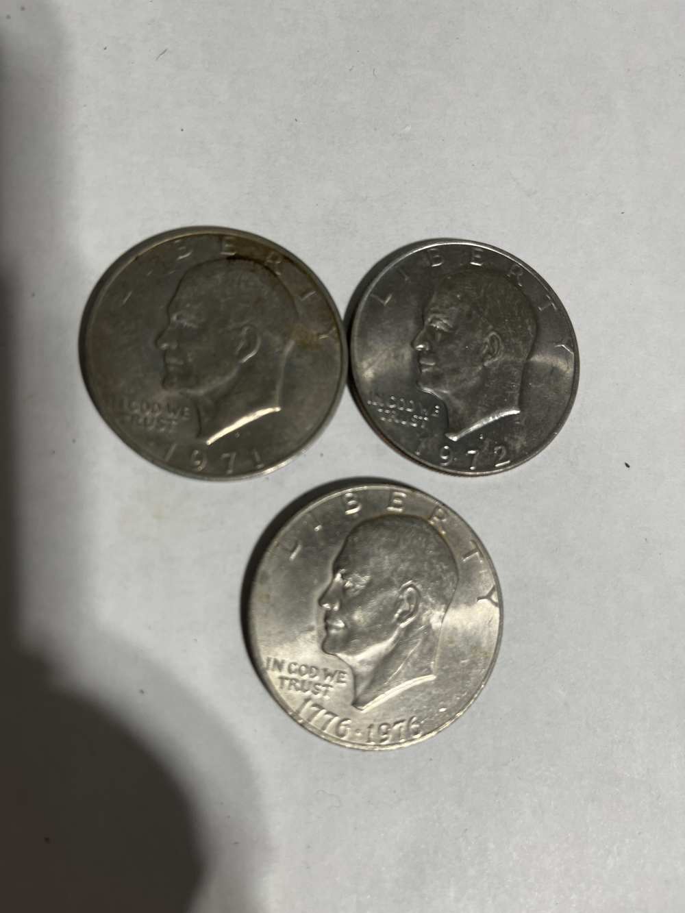 Three Ike dollar coins-img-0