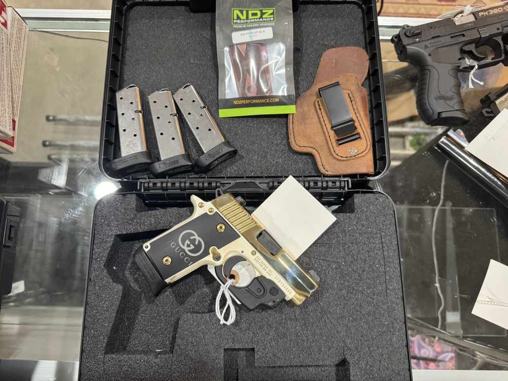 Beautiful plated Sig Sauer P238 with custom grips!-img-0