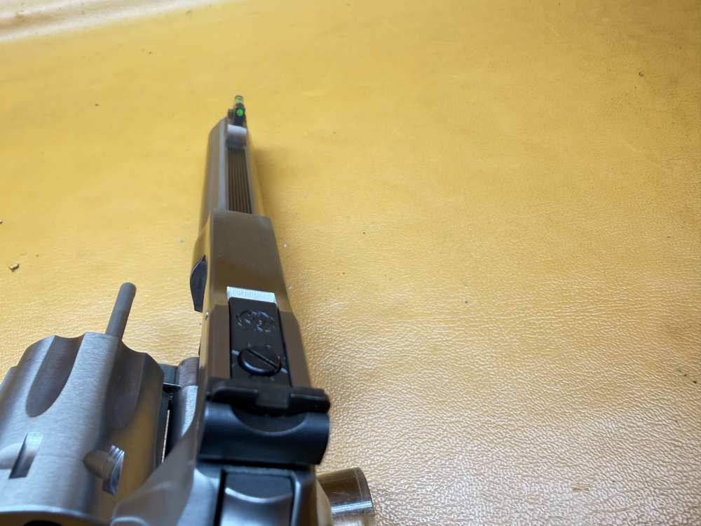 Ruger SP101 8-Shot .22 LR Revolver – 4.2" Stainless, Wood Insert Grips-img-10
